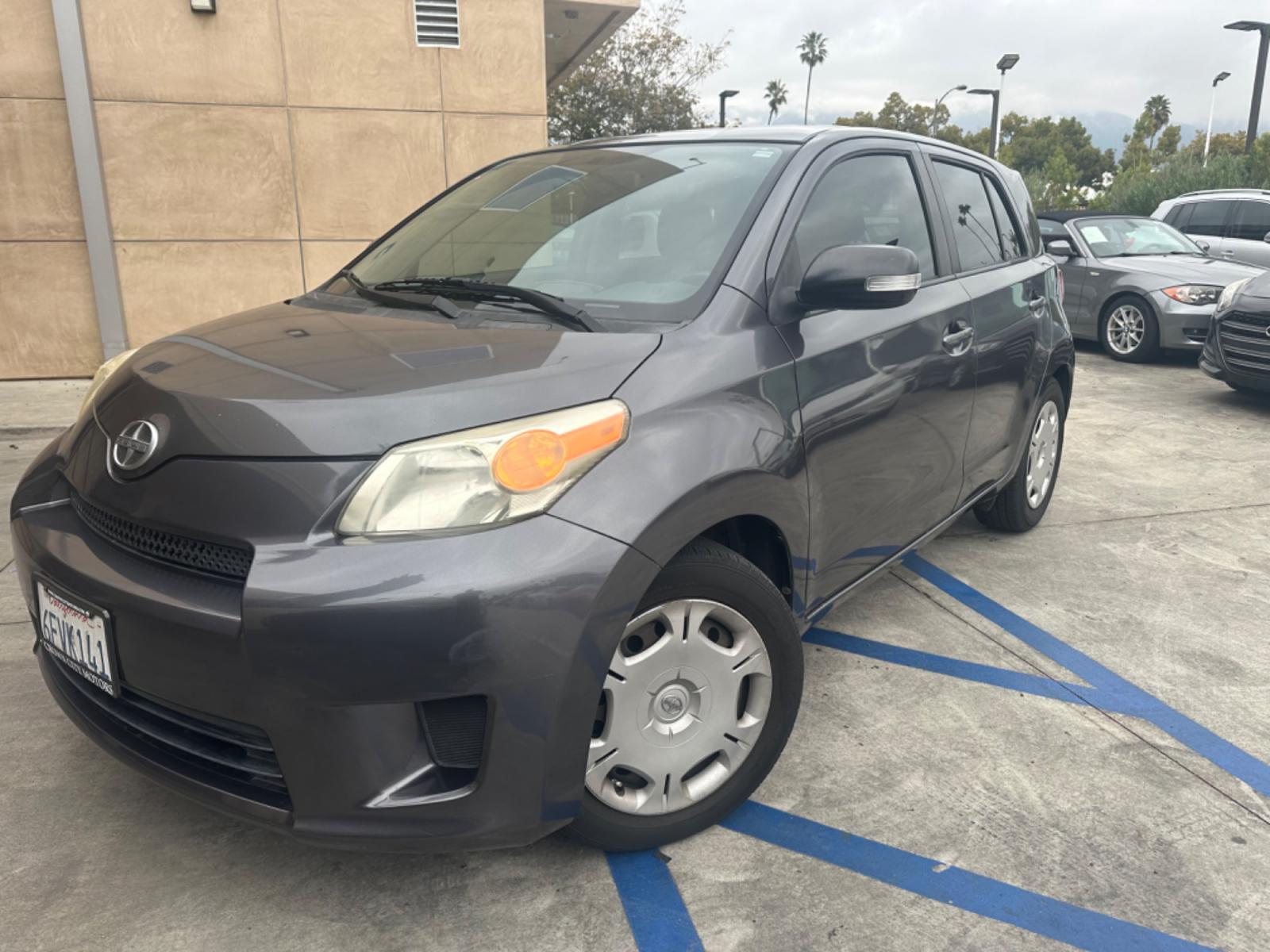 2009 Gray /Black Scion xD 5-Door (JTKKU104X9J) with an 1.8L L4 DOHC16V engine, automatic transmission, located at 30 S. Berkeley Avenue, Pasadena, CA, 91107, (626) 248-7567, 34.145447, -118.109398 - The 2009 Scion XD 4-Door Hatchback is a compact, versatile, and stylish vehicle that offers an exceptional driving experience. Located in the heart of Pasadena, CA, our dealership specializes in a comprehensive selection of used BHPH (Buy Here Pay Here) cars, including the dynamic Scion XD. This veh - Photo #0